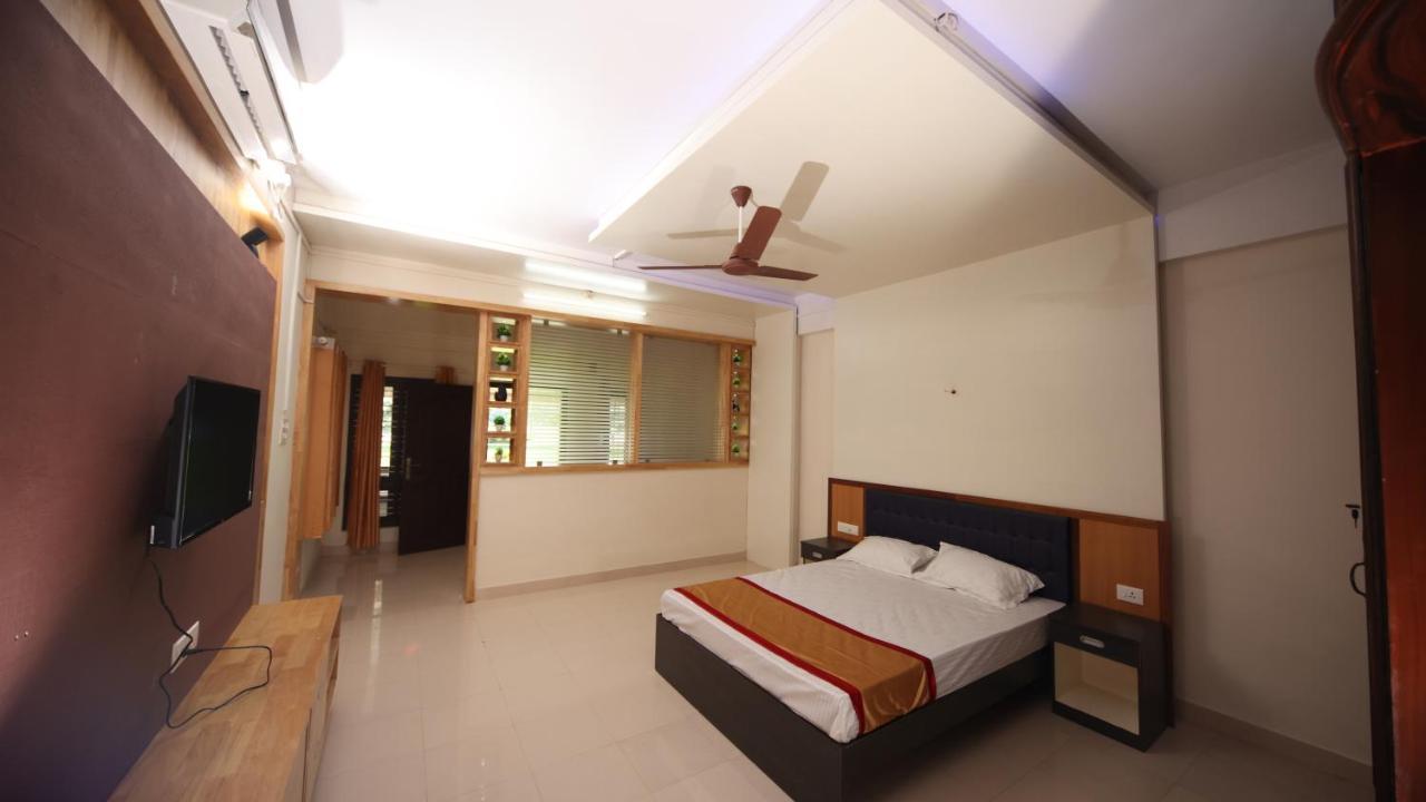 Ashtamudi Lake Garden Resorts Kollam Extérieur photo
